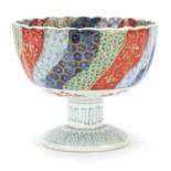 Japanese Imari porcelain pedestal bowl hand painted with flowers, 13cm high x 15cm in diameter