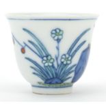 Chinese doucai porcelain tea bowl hand painted with bats amongst flowers, inscribed to the base, 4.