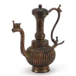 Tibetan gilt bronze wine ewer, 24cm high