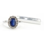 18ct white gold oval kyanite and round brilliant cut diamond cluster ring with certificate, total