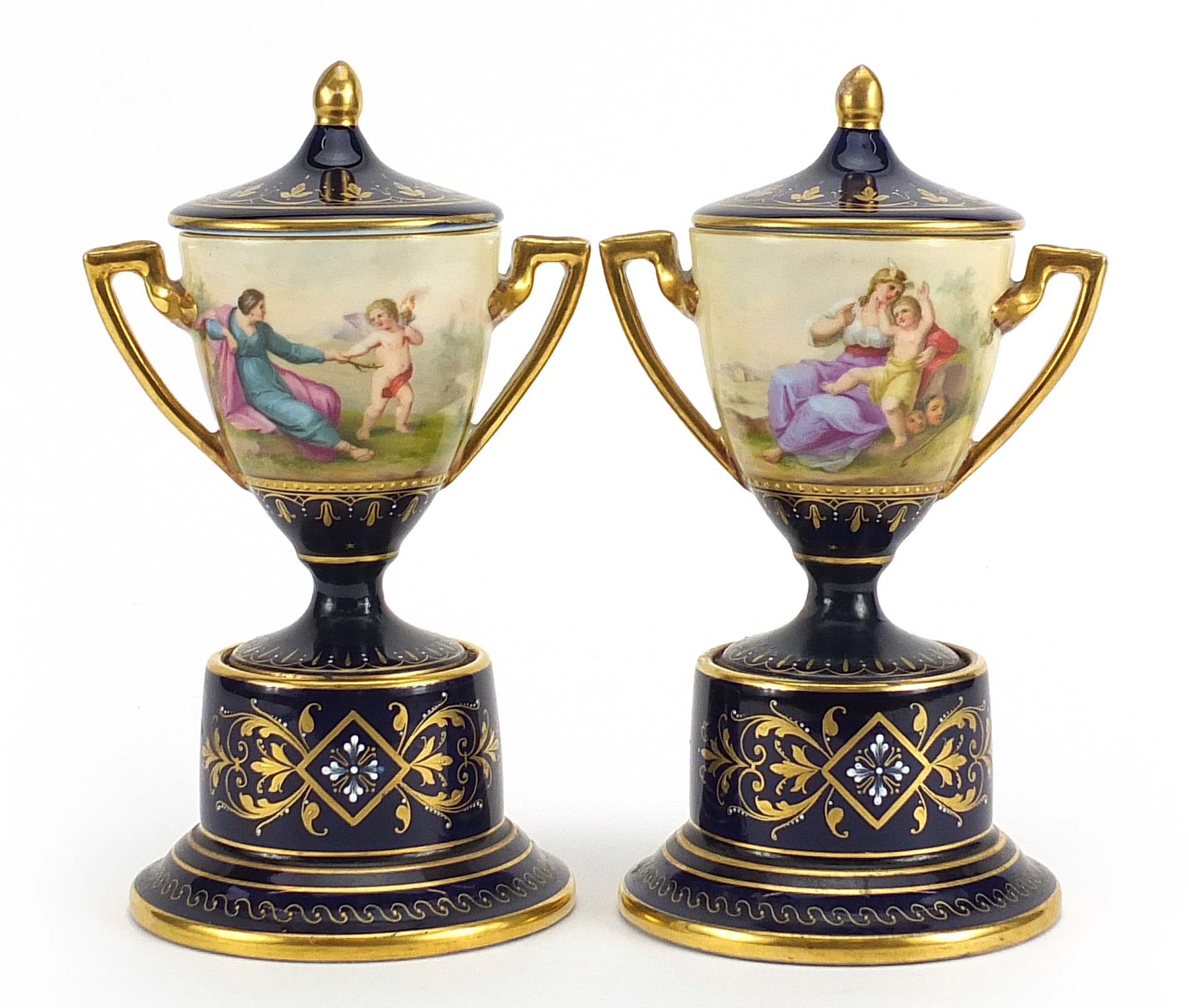 Pair of Royal Vienna porcelain pedestal vases and covers with twin handles, each hand painted with