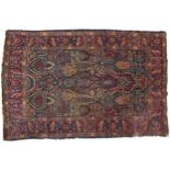 Rectangular Persian red and blue ground rug having an all over floral design, 195cm x 140cm