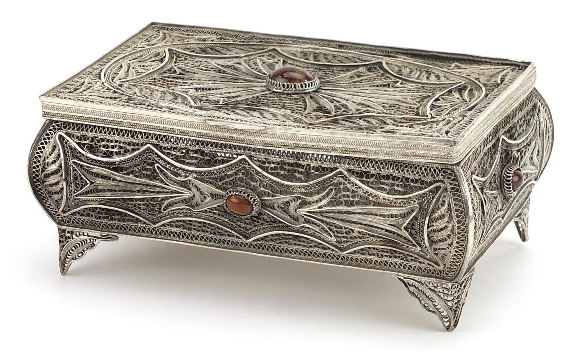 Russian silver filigree casket with hinged lid set with cabochon hardstones, 7cm H x 16cm W x 10.5cm