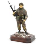 Ashmore for Worcester porcelain commemorative military figure raised on a wooden plinth base, A