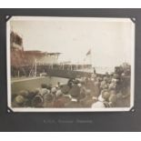 Collection of black and white photographs arranged in an album relating to HMS Repulse Royal Tour