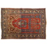 Rectangular Middle Eastern red and blue ground prayer mat, 185cm x 135cm