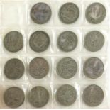 British pre decimal coinage arranged in an album including pre 1947 half crowns