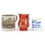Three 19th century and later mugs including a glass example and one commemorating steam engines, the