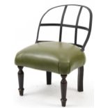 Industrial style wrought iron chair with green leather upholstered seat on turned mahogany legs,