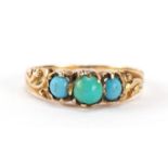 Antique unmarked gold cabochon turquoise three stone ring with foliate shoulders, size J, 1.8g