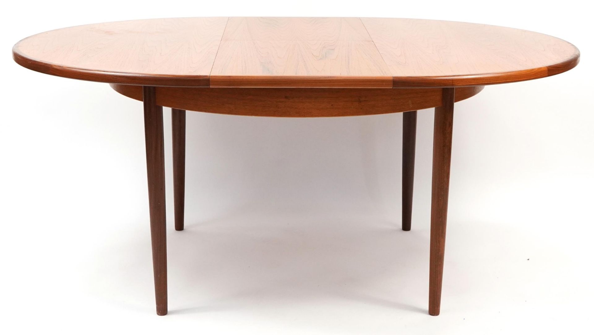 Mid century G Plan teak extending dining table and six chairs, the table 72cm high x 122cm in - Image 2 of 6