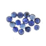 Fifteen unmounted round cut blue sapphire solitaires, approximately 1.65 carat in total