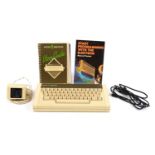 Vintage Acorn Electron computer with user guide