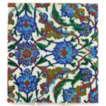 Turkish Iznik pottery tile hand painted with leaves and flowers, 26cm x 24cm