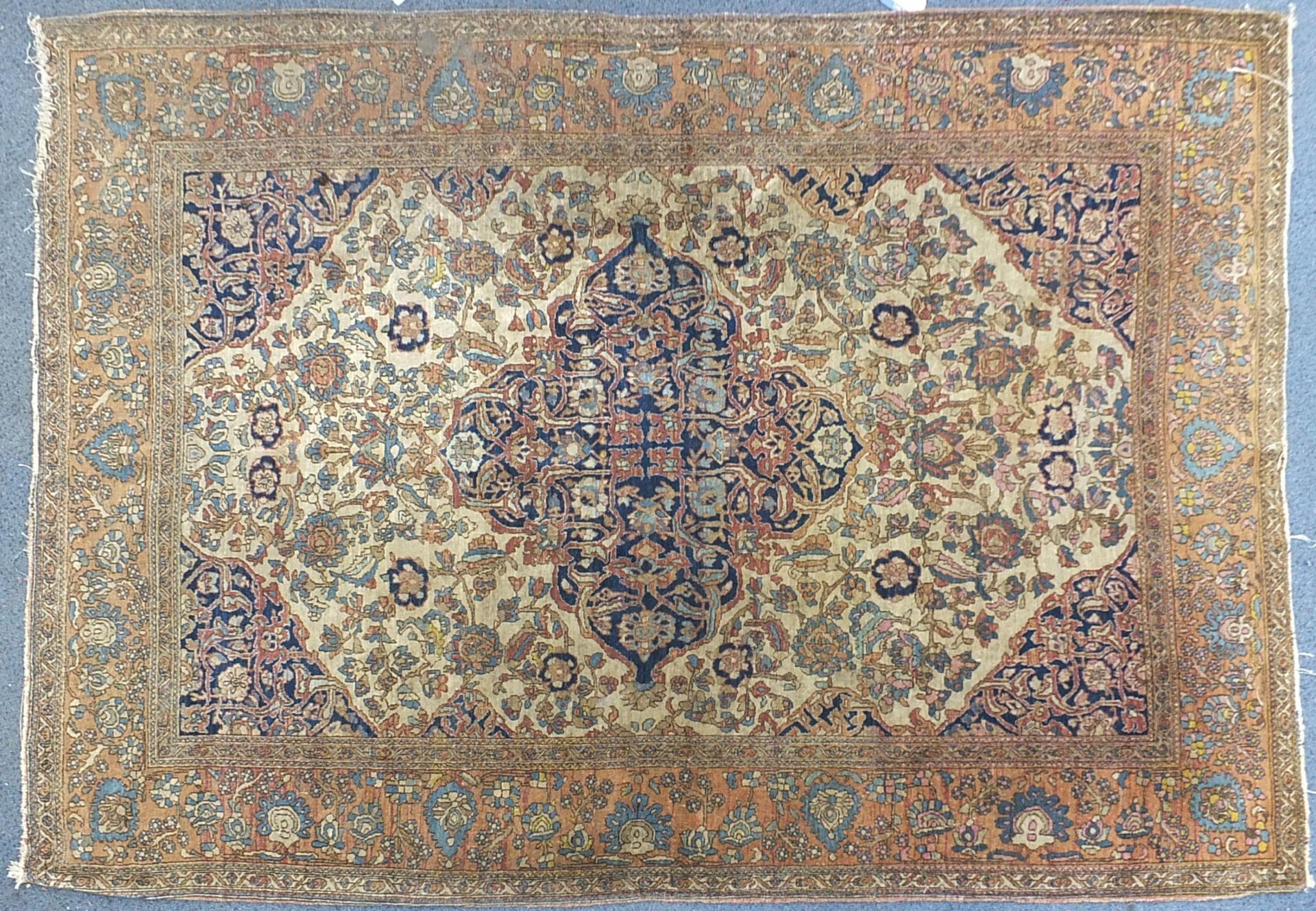 Rectangular beige and blue ground rug having an all over floral design, 205cm x 143cm