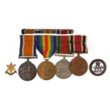 British military World War I and World War II four medal group with two badges, the Victory medal