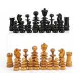 Turned boxwood and ebonised chess set, the largest piece 7.4cm high