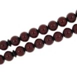 Cherry amber coloured Tesbih prayer beads, 47cm in length