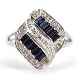 9ct white gold sapphire and diamond crossover ring, size O, 3.7g