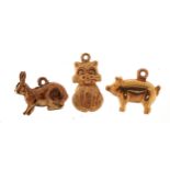 Three 9ct gold animal charms comprising cat, pig and rabbit, the largest 1.6cm high, total 2.1g