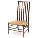 Morris & Co for Liberty & Co, fireside chair with rush seat, 84cm high