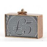 9ct gold emergency five pound note charm, 1.9cm wide, 2.8g