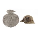 Two German military interest badges comprising Seefahrt 1ST knot and one in the form of a helmet