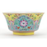 Chinese porcelain bowl hand painted in the famille rose palette with flower heads amongst
