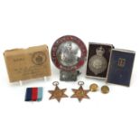 Objects including Boy's Brigade car badge and two World War II stars