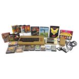 Vintage Commodore 64 console with a collection of games