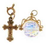 Two 9ct gold charms and a jewellery clasp, the largest 2.0cm high, 4.4g