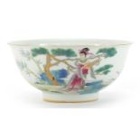 Chinese porcelain bowl hand painted in the famille rose palette with a female in a landscape, four