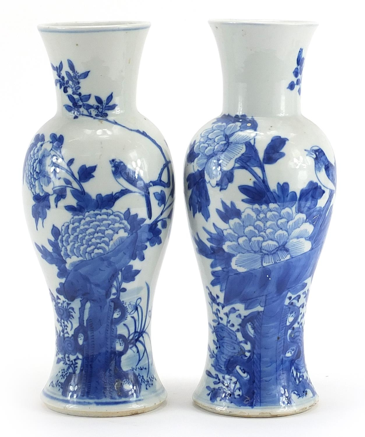 Pair of Chinese porcelain baluster vases hand painted with butterflies and birds amongst flowers,