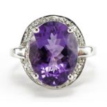 9ct white gold amethyst and diamond ring, size O/P, 5.5g