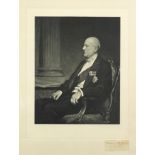 Portrait of a seated gentleman wearing medals, black and white photographic print with indistinct