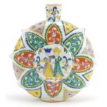 Turkish Kutahya pottery water flask hand painted with figures and flowers, 21.5cm high
