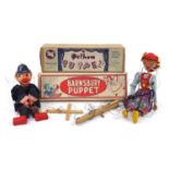 Two vintage puppets with boxes comprising Pelham Dutch girl and Barnsbury policeman