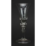 18th century wine glass with bell shaped bowl on folded foot, 15cm high