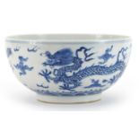 Chinese blue and white porcelain bowl hand painted with dragons chasing a flaming pearl amongst