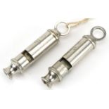 Two military interest World War II ARP Warden's whistles, Hudson & Co Birmingham, each 8.5cm in