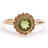 9ct gold peridot ring, size Q, 1.7g