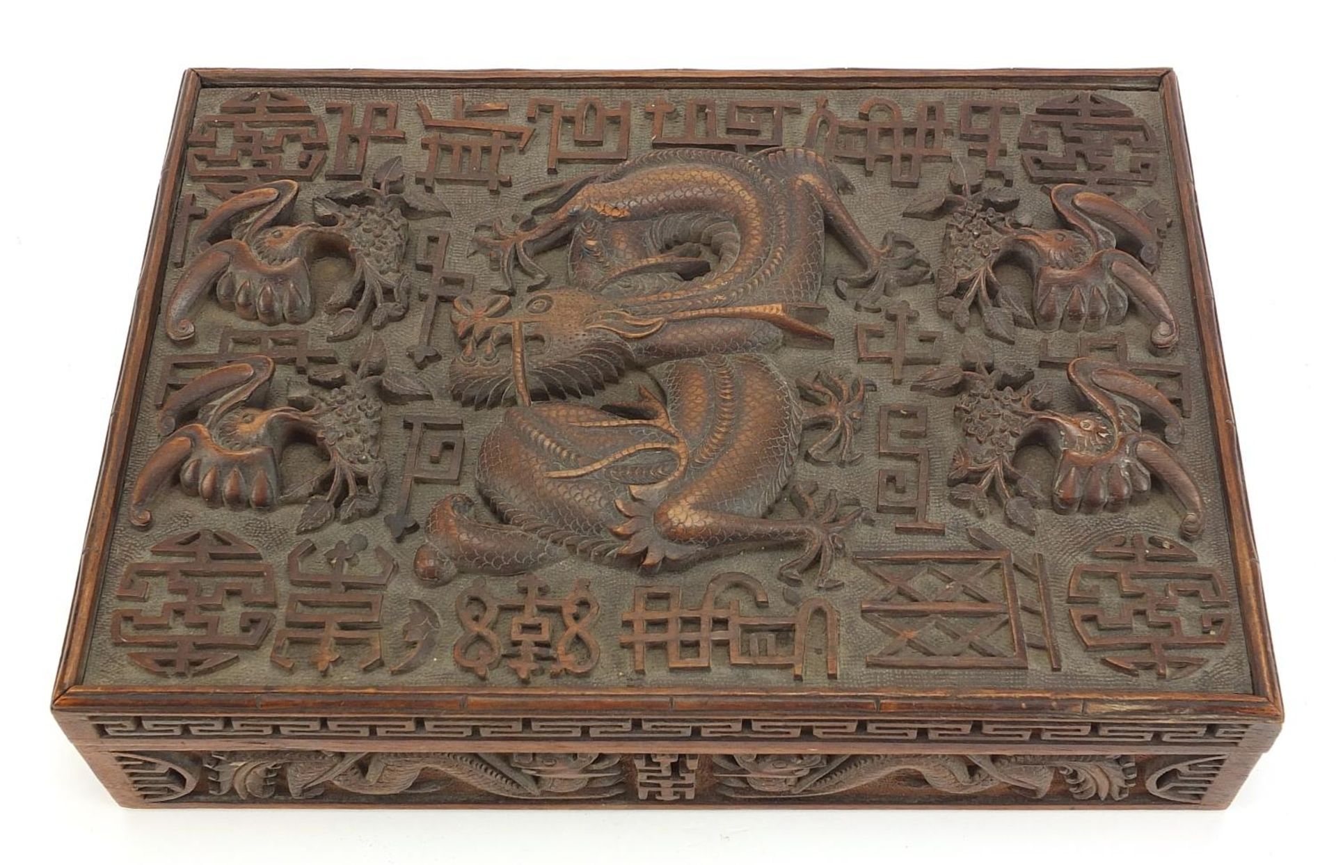 Large Chinese hardwood workbox deeply carved in relief with dragons and bats, 7.5cm H x 30.5cm W x - Image 2 of 5