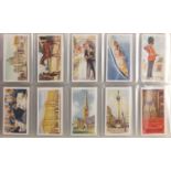 Collection of vintage cigarette cards arranged in two albums including John Player's, Wills and