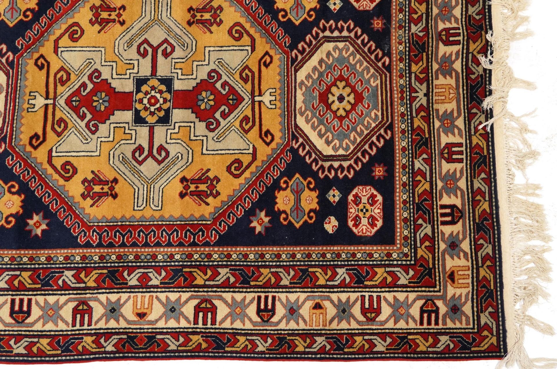 Rectangular Middle Eastern red and blue ground rug having an all over geometric design, 200cm x - Image 5 of 6