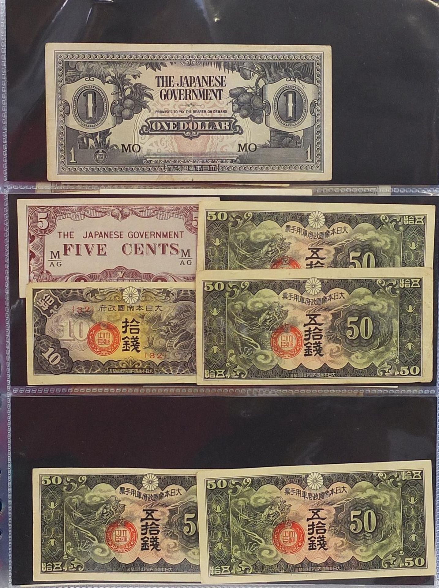 Collection of world banknotes arranged in an album including China and Brazil - Image 4 of 6