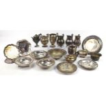 Silverplate including circular trays, teapots and jugs, the largest 35cm in diameter