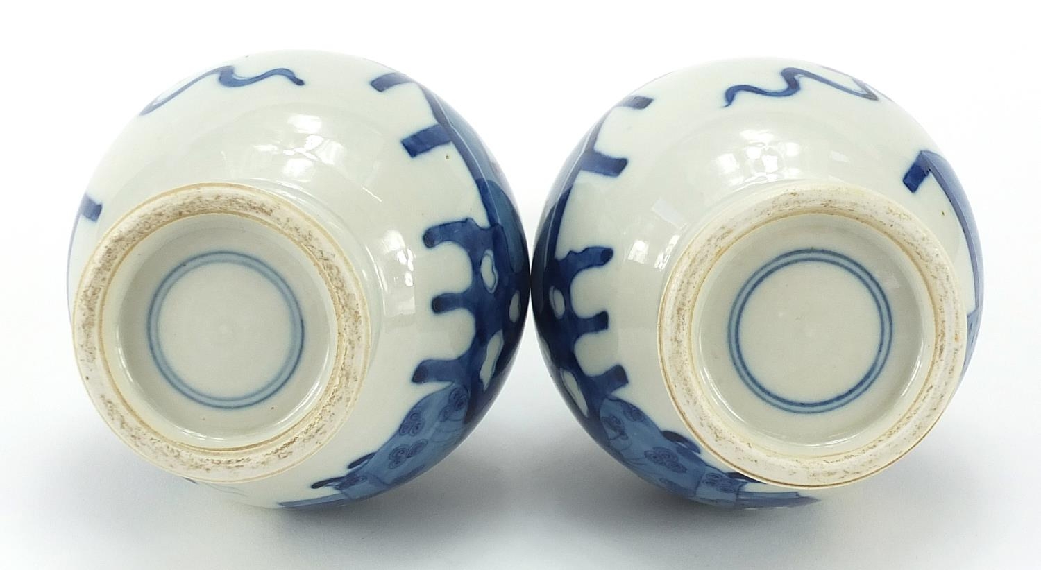 Pair of Chinese blue and white porcelain vases hand painted with figures and Daoist emblems, - Image 3 of 3