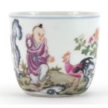 Chinese porcelain cup hand painted in the famille rose palette with a figure feeding a chicken,