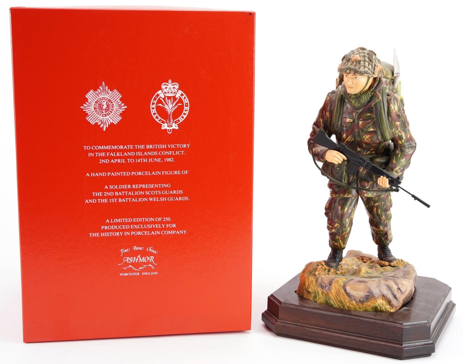 Ashmore for Worcester porcelain commemorative military figure raised on a wooden plinth base,