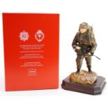 Ashmore for Worcester porcelain commemorative military figure raised on a wooden plinth base,
